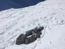 Some skier triggered roller balls and loose wet snow on a steep SE facing aspect at 12:15 pm. 