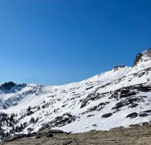 Cornice over Elephants Graveyard. No significant recent broken chunks observed.