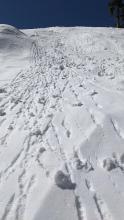 Small rollerballs and pinwheels made of the storm snow on an E aspect on Andesite Peak