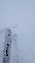 Minor cracking in a soft wind slab on a wind-loaded E facing test slope around 8100 ft on Andesite Peak