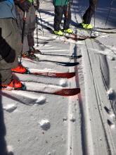 Students ski tips in some soft surface faceted snow