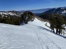 S facing ridge top snow softening at noon.