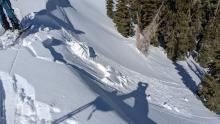 Small wind slab and cornice collapse on a NE aspect with NE wind protection.