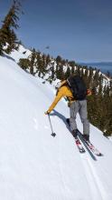 Shallow wet snow on top of a thin refrozen crust on top of a few more inches of wet snow on an E aspect at 9100 ft. 