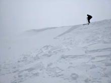 Wind slab failure triggered by a ski kick on an E-ENE facing test slope.