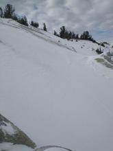 A mix of wind loaded and wind scoured areas in N aspect terrain on the Far East Ridge of Tamarack Peak.