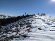 East winds scouring east facing slopes and blowing snow onto west facing slopes.