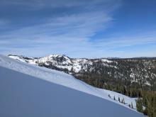 Previously wind loaded area where the snow was quite firm. Now, the snow surface is softer and more punchy.