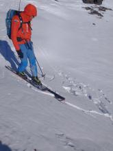 Soft weak snow also existed under a thin wind crust on an exposed E aspect near the ridgeline.