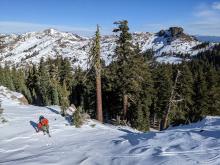 Weak faceted snow existed on the surface near the ridgeline in areas where trees offered any protection from the winds.