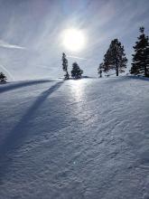 Melt freeze crust on a N aspect near 7400 ft. 