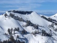 Large natural wind slab avalanche off of Flat Top peak