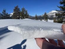 Hard melt freeze crusts on solar aspects above 7600'.