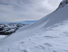 Rough snow in the foreground and smooth, firm snow in the background