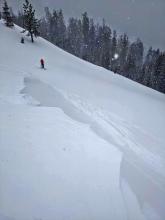 Skier triggered wind slab avalanche on a wind-loaded test slope on Andesite Peak.