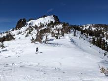 Wind-affected snow surfaces were widespread on exposed upper elevation slopes.