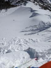 Small cornice pieces broke and fell onto test slopes when kicked, but they did not trigger wind slab failures in the test slopes.