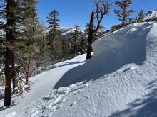 Small N facing cornice at 8200 feet broke a few inches deep and propagated about 10 feet in response to ski kicks.