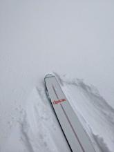 About 3 inches of snow on top of a crust near the trailhead.