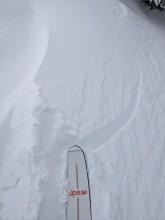 Ski kicks triggered shooting cracks on wind-loaded slopes in near treeline terrain.