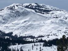 Wet loose avalanches occurring on the North Side of Donner Peak by 1pm.