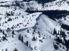 Corniced ridgeline of Powerline Peak with only small and previous collapses by noon.