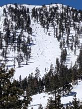 Rollerballs, pinwheels, and wet loose activity on the E face of Jakes Peak.