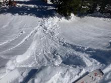 Ski kicks on small test slopes create wet snow instabilities.