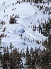 Recent cornice collapses on nearby ridges. 