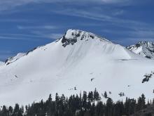 Recent cornice fall with wet loose activity on the main face of Elephant's Back.