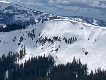 Recent cornice collapse with wet loose avalanche along the Lincoln/Anderson Ridgeline.