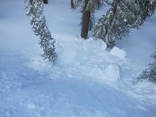 Main chunk of broken cornice (approximately size of a skinny van).