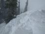 Debris on the smaller flank of the avalanche. As it wraps around the corner the slope becomes larger and more open.