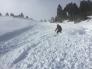 Skiing debris field after controlled ski cut release