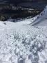 Looking down avalanche debris.