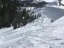 Small, wide slab avalanche just below the Crest